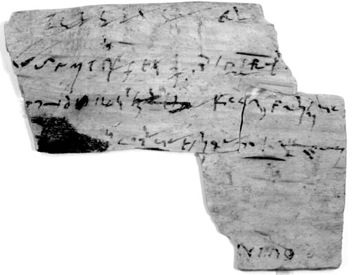 A fragment with several lines of shorthand. At the bottom (upside down) part of a text in capital letters (122)