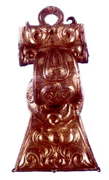 The Aesica Brooch. The form and swirling scroll decoration derive from pre-Roman 'Celtic' metalwork. The 10cm high gilded bronze brooch would probably have been worn as one of a pair at the shoulders, linked by a chain through the loop.